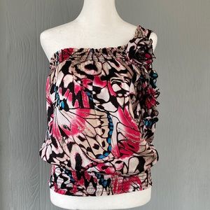Bebe one shoulder multicolored silk top with flower accent